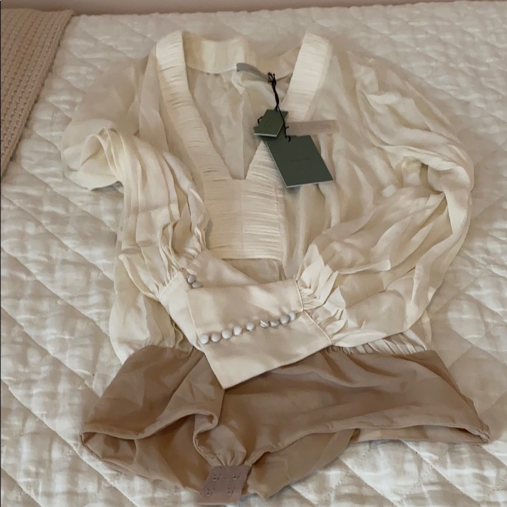 Sheer cream blouse
